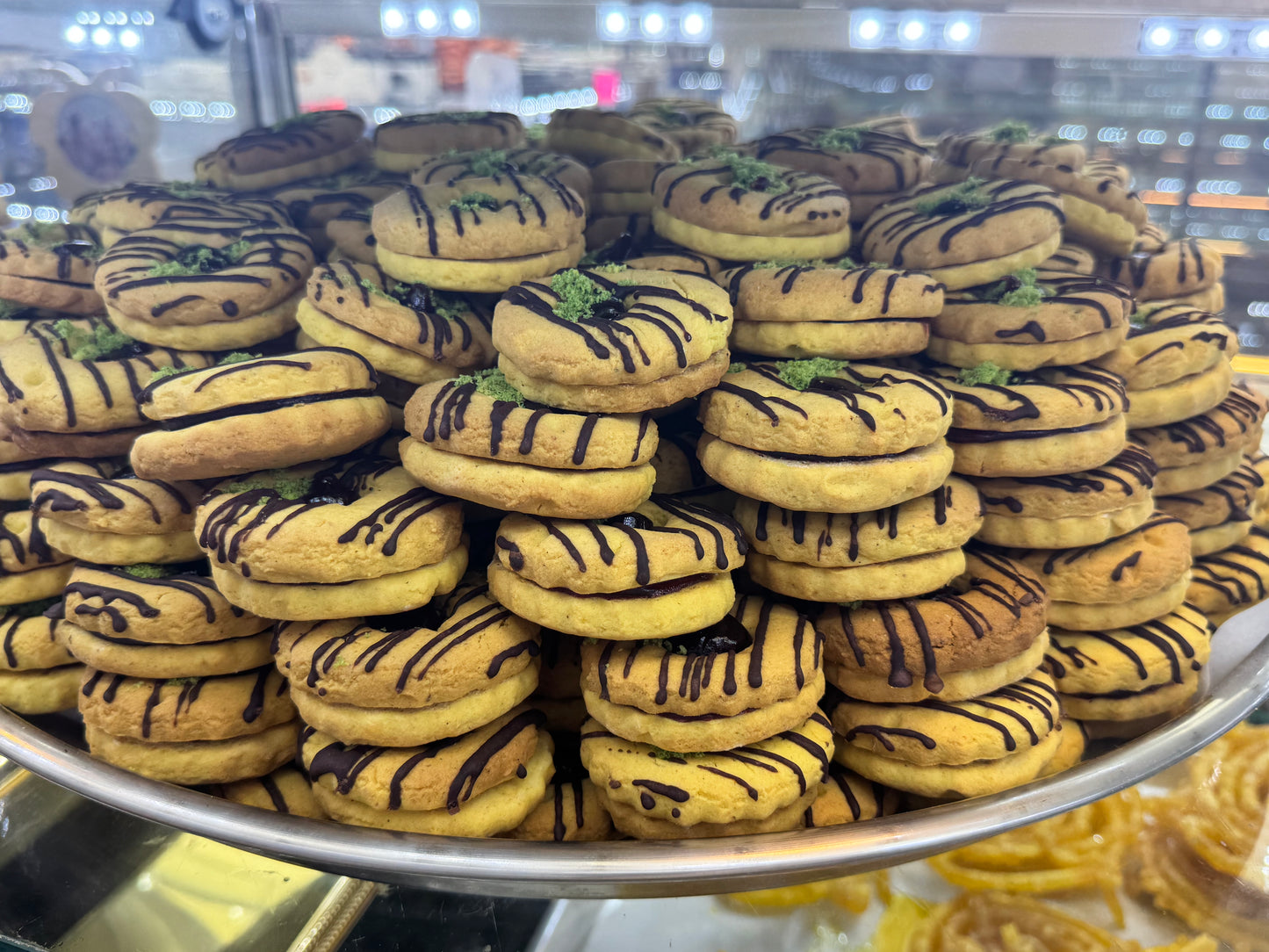 Afghan Chocolate Drizzle Jam Sandwich Cookies – 12.99/lb