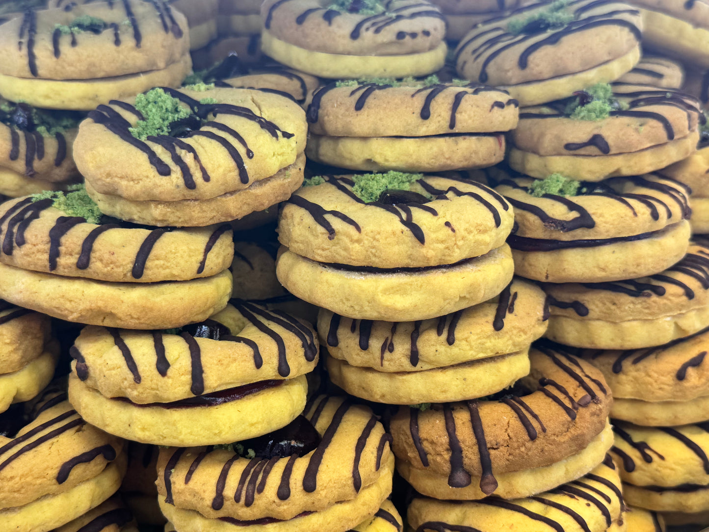 Afghan Chocolate Drizzle Jam Sandwich Cookies – 12.99/lb